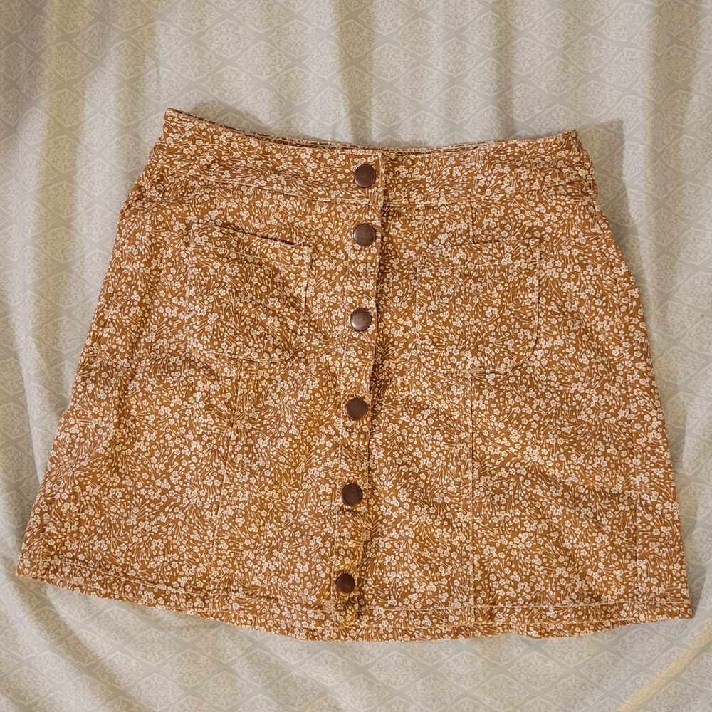Snap button mini skirt